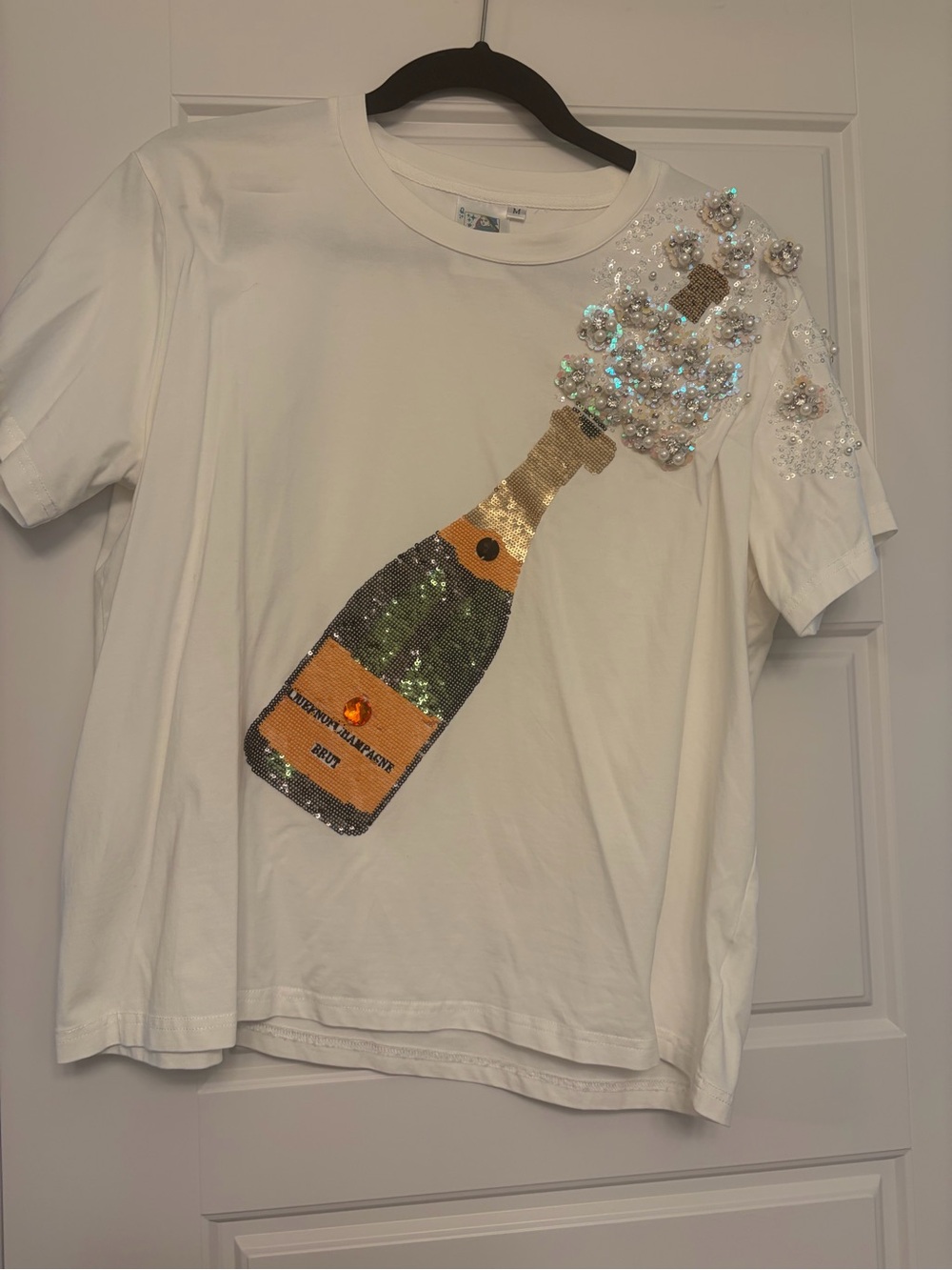 QUEEN OF SPARKLES White Sequin Champagne Bottle Tee Medium
